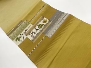 色紙に花唐草模様織出し名古屋帯